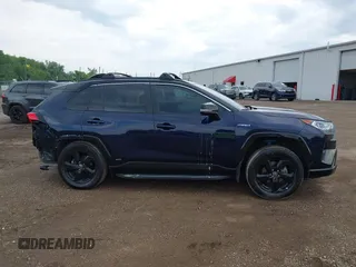 2021 Toyota RAV4 Hybrid XSE with VIN 4T3E6RFV0MU053245, listed as a IAAI auction lot 42426959 with 28,717 mi miles and . Bid and sale history available at DreamBid. Image 13.