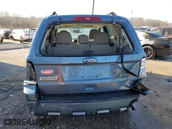 2011 Ford Escape Hybrid z VIN 1FMCU4K35BKB58210, wystawiony jako Copart lot #42141165 z przebiegiem 175 636 mil mil oraz Nie do naprawy • Non repairable. Historia ofert i sprzedaży dostępna na DreamBid. Obrazek 6.