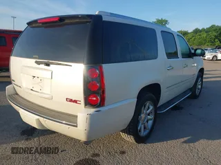 2012 GMC Yukon XL Denali with VIN 1GKS1MEF6CR138320, listed as a IAAI auction lot 42123524 with 184,182 mi miles. Bid and sale history available at carsss.com. Image 4.