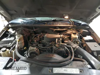 2000 Chevrolet Blazer LS z VIN 1GNCT18W9YK188091, wystawiony jako Copart lot #78592844 z przebiegiem 69 497 mil mil oraz Szkoda całkowita • Salvage title. Historia ofert i sprzedaży dostępna na DreamBid. Obrazek 12.
