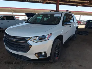 2020 Chevrolet Traverse Premier with VIN 1GNERKKW3LJ117912, listed as a IAAI auction lot 42317330 with 113,576 mi miles and . Bid and sale history available at DreamBid. Image 2.