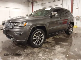 2017 Jeep Grand Cherokee Overland z VIN 1C4RJFCG6HC641812, wystawiony jako IAAI lot #42053404 z przebiegiem 129 184 mil mil oraz . Historia ofert i sprzedaży dostępna na DreamBid. Obrazek 18.