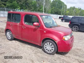 2011 Nissan Cube S z VIN JN8AZ2KR4BT207126, wystawiony jako IAAI lot #42258237 z przebiegiem 140 060 mil mil oraz . Historia ofert i sprzedaży dostępna na DreamBid. Obrazek 1.