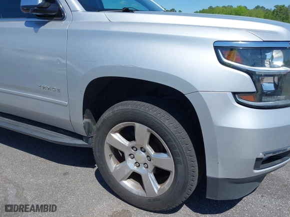 2015 Chevrolet Tahoe LTZ with VIN 1GNSCCKC3FR202934, listed as a IAAI auction lot 41995474 with 258,186 mi miles. Bid and sale history available at carsss.com. Image 17.