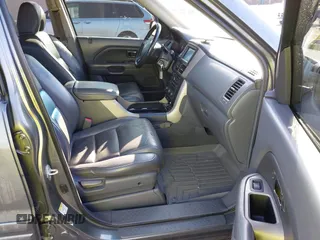 2007 Honda Pilot EX-L with VIN 2HKYF18727H528564, listed as a IAAI auction lot 42010708 with 260,364 mi miles and . Bid and sale history available at DreamBid. Image 5.