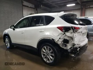 2014 Mazda CX-5 Grand Touring with VIN JM3KE4DY7E0417308, listed as a Copart auction lot 88161195 with 107,493 mi miles and Salvage Title. Bid and sale history available at carsss.com. Image 2.