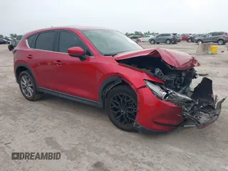 2019 Mazda CX-5 Grand Touring with VIN JM3KFBDM7K0503874, listed as a IAAI auction lot 42151054 with 98,961 mi miles and . Bid and sale history available at DreamBid. Image 1.