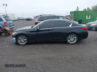 2014 Infiniti Q50 Premium z VIN JN1BV7AR2EM705630, wystawiony jako IAAI lot #42258650 z przebiegiem 109 151 mil mil oraz . Historia ofert i sprzedaży dostępna na DreamBid. Obrazek 14.