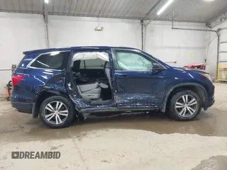 2017 Honda Pilot EX-L z VIN 5FNYF6H54HB045735, wystawiony jako IAAI lot #42296341 z przebiegiem 122 607 mil mil oraz . Historia ofert i sprzedaży dostępna na DreamBid. Obrazek 14.
