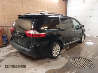 2015 Toyota Sienna Ltd with VIN 5TDDK3DCXFS122419, listed as a IAAI auction lot 41336752 with 243,567 mi miles. Bid and sale history available at carsss.com. Image 4.
