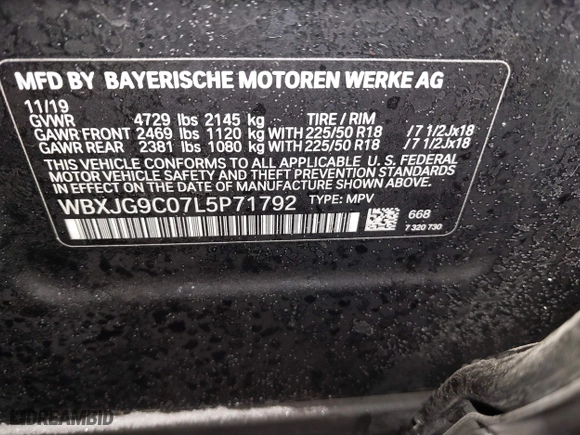 2020 BMW X1 xDrive28i with VIN WBXJG9C07L5P71792, listed as a IAAI auction lot 41583132 with 150,095 mi miles. Bid and sale history available at carsss.com. Image 9.