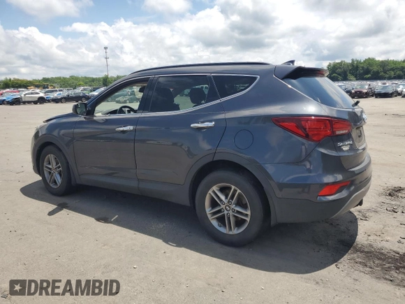 2017 Hyundai Santa Fe 2.4L z VIN 5XYZUDLB8HG430221, wystawiony jako Copart lot #64330015 z przebiegiem 151 318 mil mil oraz Szkoda całkowita • Salvage title. Historia ofert i sprzedaży dostępna na DreamBid. Obrazek 2.