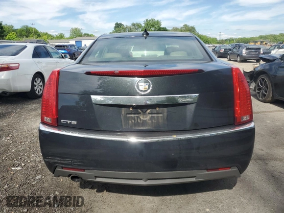2011 Cadillac CTS Luxury z VIN 1G6DE5EY4B0102325, wystawiony jako Copart lot #57691775 z przebiegiem 157 711 mil mil oraz Szkoda całkowita • Salvage title. Historia ofert i sprzedaży dostępna na DreamBid. Obrazek 6.