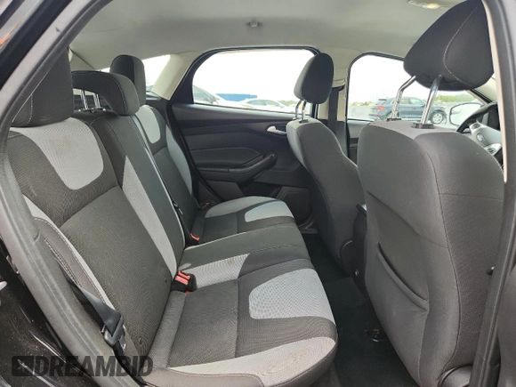 2012 Ford Focus SE z VIN 1FAHP3K25CL248672, wystawiony jako Copart lot #58129345 z przebiegiem 124 687 mil mil oraz Szkoda całkowita • Salvage title. Historia ofert i sprzedaży dostępna na DreamBid. Obrazek 11.