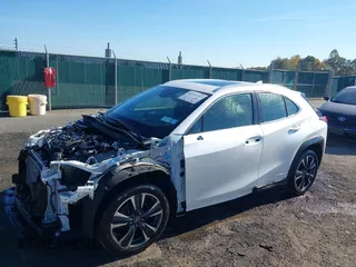 2021 Lexus UX with VIN JTHP9JBH5M2053797, listed as a IAAI auction lot 40718103 with 57,366 mi miles. Bid and sale history available at carsss.com. Image 2.