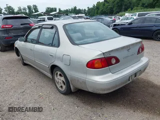 2002 Toyota Corolla CE with VIN 2T1BR12E62C551085, listed as a IAAI auction lot 42785690 with 121,542 mi miles and . Bid and sale history available at DreamBid. Image 3.