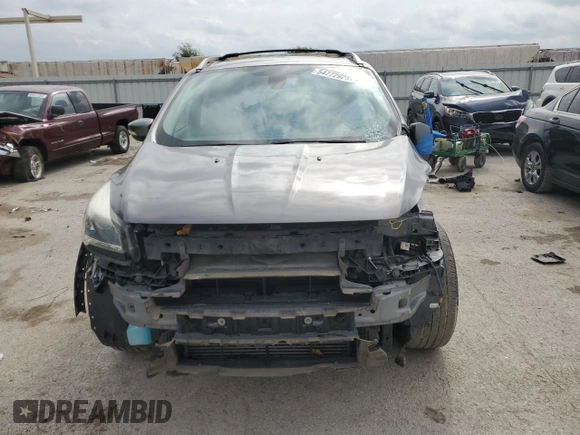 2013 Ford Escape Titanium z VIN 1FMCU0J98DUB64363, wystawiony jako Copart lot #54772925 z przebiegiem 109 956 mil mil oraz Szkody całkowita. Historia ofert i sprzedaży dostępna na DreamBid. Obrazek 5.