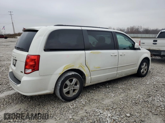 2012 Dodge Grand Caravan SXT with VIN 2C4RDGCG7CR364598, listed as a Copart auction lot 81848314 with 173,022 mi miles and Non Repairable. Bid and sale history available at DreamBid. Image 3.