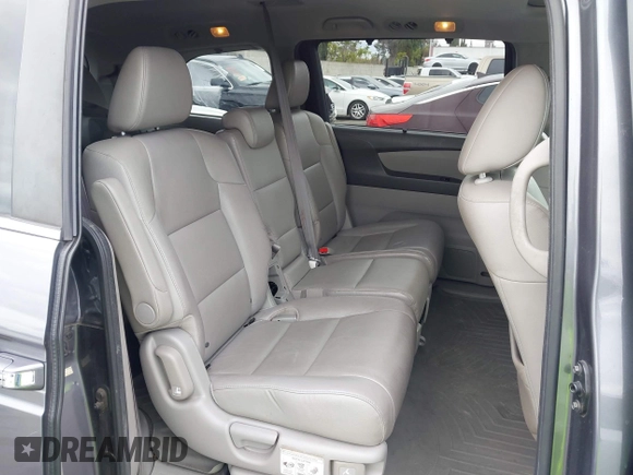 2014 Honda Odyssey EX-L with VIN 5FNRL5H64EB055807, listed as a IAAI auction lot 41760758 with 144,346 mi miles and . Bid and sale history available at carsss.com. Image 8.