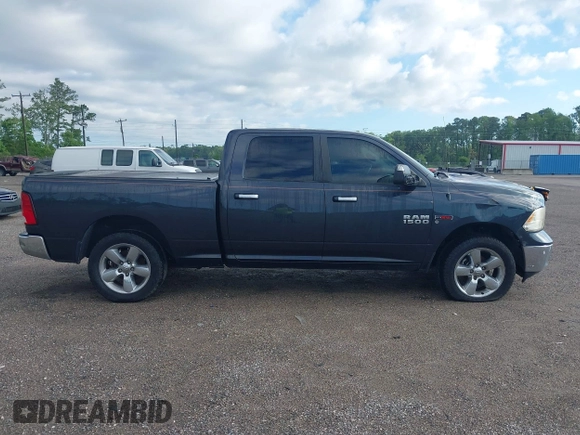 2015 Ram 1500 Big Horn z VIN 1C6RR7TM8FS711048, wystawiony jako IAAI lot #41760186 z przebiegiem Nie podano mil oraz . Historia ofert i sprzedaży dostępna na DreamBid. Obrazek 13.