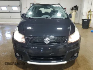 2009 Suzuki SX4 Touring AWD with VIN JS2YB417496202243, listed as a Copart auction lot 53842055 with 70,544 mi miles and Salvage Title. Bid and sale history available at DreamBid. Image 5.