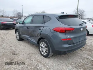 2021 Hyundai Tucson SE with VIN KM8J23A40MU299596, listed as a IAAI auction lot 41513198 with 54,284 mi miles and . Bid and sale history available at DreamBid. Image 3.