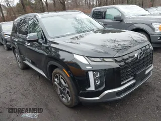 2023 Hyundai Palisade Limited z VIN KM8R5DGE7PU571811, wystawiony jako IAAI lot #41816007 z przebiegiem 5 957 mil mil oraz . Historia ofert i sprzedaży dostępna na DreamBid. Obrazek 1.