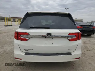 2019 Honda Odyssey Elite z VIN 5FNRL6H93KB069516, wystawiony jako Copart lot #53795885 z przebiegiem 96 808 mil mil oraz Szkoda całkowita • Salvage title. Historia ofert i sprzedaży dostępna na DreamBid. Obrazek 6.