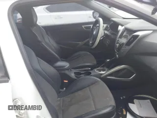 2013 Hyundai Veloster w/Black Int с VIN KMHTC6AD5DU166601, выставлен на аукционе IAAI как лот 42182995 с пробегом 143 106 миль миль и . История ставок и продаж доступна на DreamBid. Изображение 5.