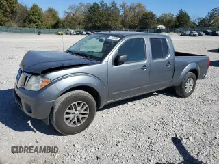 2016 Nissan Frontier SV with VIN 1N6AD0FR7GN767045, listed as a Copart auction lot 77190504 with 224,799 mi miles and Salvage title. Bid and sale history available at DreamBid. Image 1.