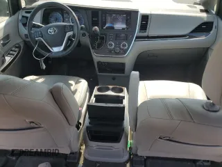 2015 Toyota Sienna XLE с VIN 5TDYK3DC7FS600281, выставлен на аукционе Copart как лот 53738065 с пробегом 91 207 миль миль и Списание • Salvage title. История ставок и продаж доступна на DreamBid. Изображение 8.