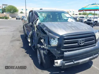 2013 Toyota Tundra z VIN 5TFRM5F15DX053654, wystawiony jako IAAI lot #42324593 z przebiegiem 128 206 mil mil oraz . Historia ofert i sprzedaży dostępna na DreamBid. Obrazek 1.
