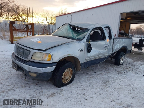 1999 Ford F-150 XL with VIN 1FTRX18LXXNA44916, listed as a IAAI auction lot 41322276 with 1 mi miles. Bid and sale history available at carsss.com. Image 2.