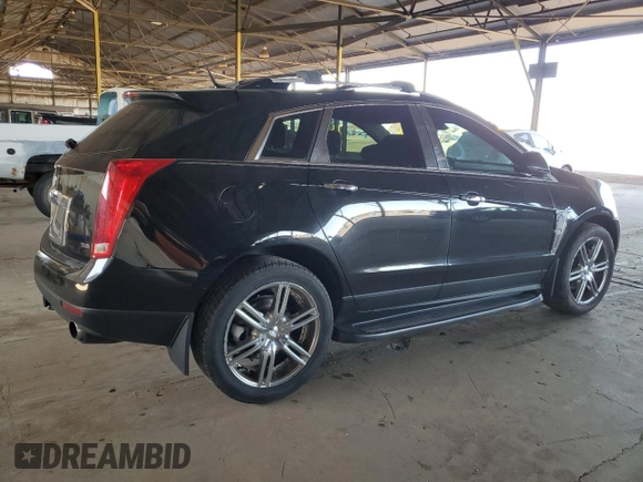 2012 Cadillac SRX Premium Collection z VIN 3GYFNFE30CS599863, wystawiony jako Copart lot #61249995 z przebiegiem 144 740 mil mil oraz Czysty tytuł • Clean title. Historia ofert i sprzedaży dostępna na DreamBid. Obrazek 3.