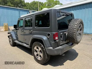 2016 Jeep Wrangler Unlimited Sahara with VIN 1C4BJWEG9GL169490, listed as a Copart auction lot 61507025 with 198,602 mi miles and Clean title. Bid and sale history available at DreamBid. Image 3.