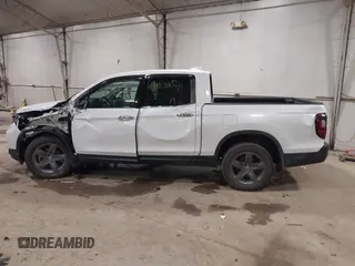 2022 Honda Ridgeline RTL-E z VIN 5FPYK3F76NB033832, wystawiony jako IAAI lot #41838047 z przebiegiem 16 497 mil mil oraz . Historia ofert i sprzedaży dostępna na DreamBid. Obrazek 15.