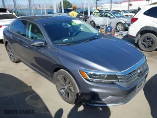 2020 Volkswagen Passat 2.0T SEL with VIN 1VWCA7A30LC025234, listed as a IAAI auction lot 41699506 with 49,117 mi miles. Bid and sale history available at carsss.com. Image 1.