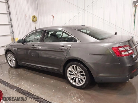 2015 Ford Taurus Limited with VIN 1FAHP2F87FG136199, listed as a IAAI auction lot 41920715 with 173,445 mi miles. Bid and sale history available at carsss.com. Image 14.