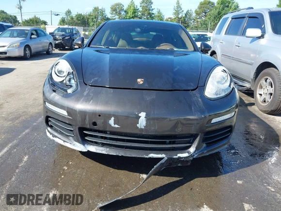 2014 Porsche Panamera S E-Hybrid with VIN WP0AD2A76EL044591, listed as a IAAI auction lot 42436817 with 89,009 mi miles and . Bid and sale history available at DreamBid. Image 12.