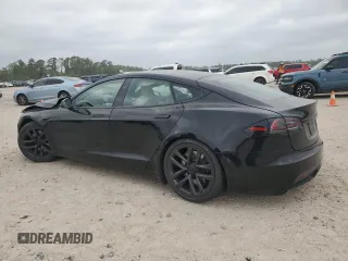 2023 Tesla Model S z VIN 5YJSA1E58PF531166, wystawiony jako Copart lot #51827565 z przebiegiem Nie podano mil oraz Szkoda całkowita • Salvage title. Historia ofert i sprzedaży dostępna na DreamBid. Obrazek 2.
