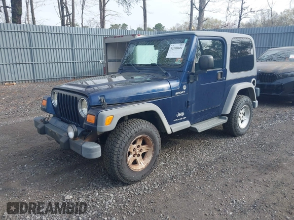 2005 Jeep Wrangler Sport z VIN 1J4FA49S25P302627, wystawiony jako IAAI lot #42100601 z przebiegiem 169 650 mil mil oraz . Historia ofert i sprzedaży dostępna na DreamBid. Obrazek 17.