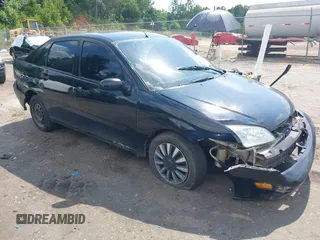2006 Ford Focus S with VIN 1FAFP34N76W233950, listed as a IAAI auction lot 42596698 with 262,504 mi miles and . Bid and sale history available at DreamBid. Image 1.