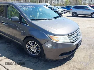 2012 Honda Odyssey EX-L with VIN 5FNRL5H68CB006686, listed as a IAAI auction lot 42039035 with 338,331 mi miles and . Bid and sale history available at carsss.com. Image 6.