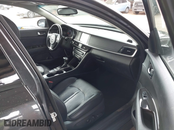 2017 Kia Optima EX with VIN 5XXGU4L36HG125627, listed as a IAAI auction lot 41949580 with 123,548 mi miles. Bid and sale history available at carsss.com. Image 5.