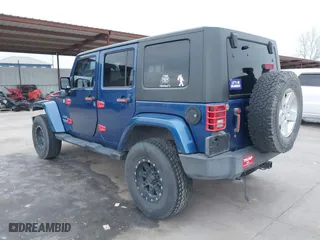 2010 Jeep Wrangler Unlimited Sport with VIN 1J4BA3H18AL105500, listed as a IAAI auction lot 41634465 with 230,453 mi miles. Bid and sale history available at carsss.com. Image 3.