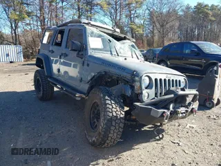 2014 Jeep Wrangler Unlimited Rubicon with VIN 1C4BJWFG3EL248164, listed as a IAAI auction lot 41290490 with 116,383 mi miles. Bid and sale history available at carsss.com. Image 1.