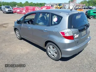 2009 Honda Fit with VIN JHMGE882X9S000639, listed as a IAAI auction lot 42308524 with 211,128 mi miles and . Bid and sale history available at DreamBid. Image 3.