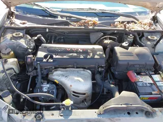 2002 Toyota Camry LE z VIN 4T1BE32K52U506649, wystawiony jako IAAI lot #41586416 z przebiegiem 312 245 mil mil oraz . Historia ofert i sprzedaży dostępna na DreamBid. Obrazek 10.