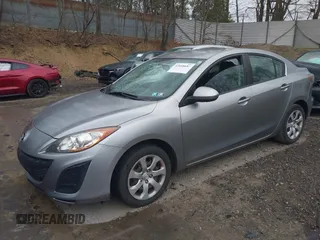 2011 Mazda Mazda3 i Sport with VIN JM1BL1UG0B1401901, listed as a IAAI auction lot 42058681 with 147,060 mi miles. Bid and sale history available at carsss.com. Image 2.