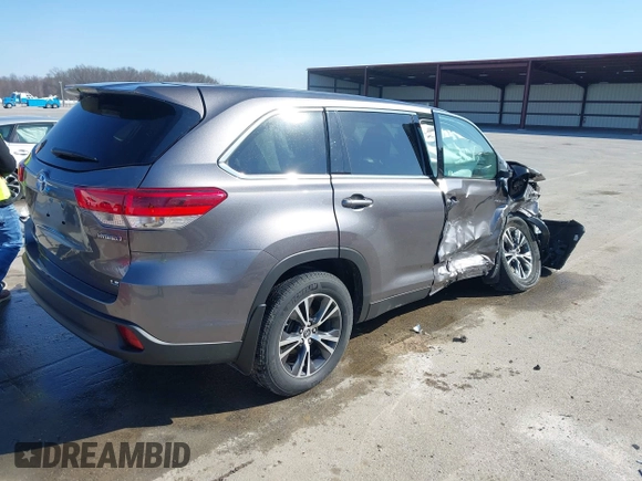 2019 Toyota Highlander Hybrid LE with VIN 5TDBGRFH3KS076303, listed as a IAAI auction lot 41770576 with 15,591 mi miles and . Bid and sale history available at DreamBid. Image 4.